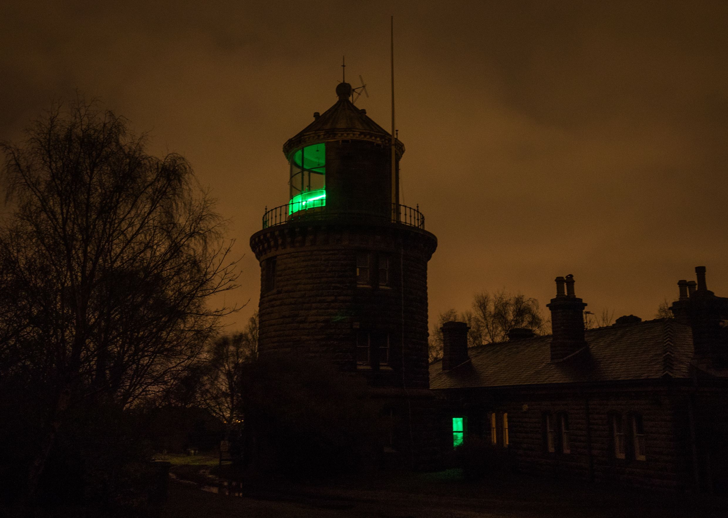 Bidston Lighthouse lit green for Clatterbridge Cancer Centre, 2017