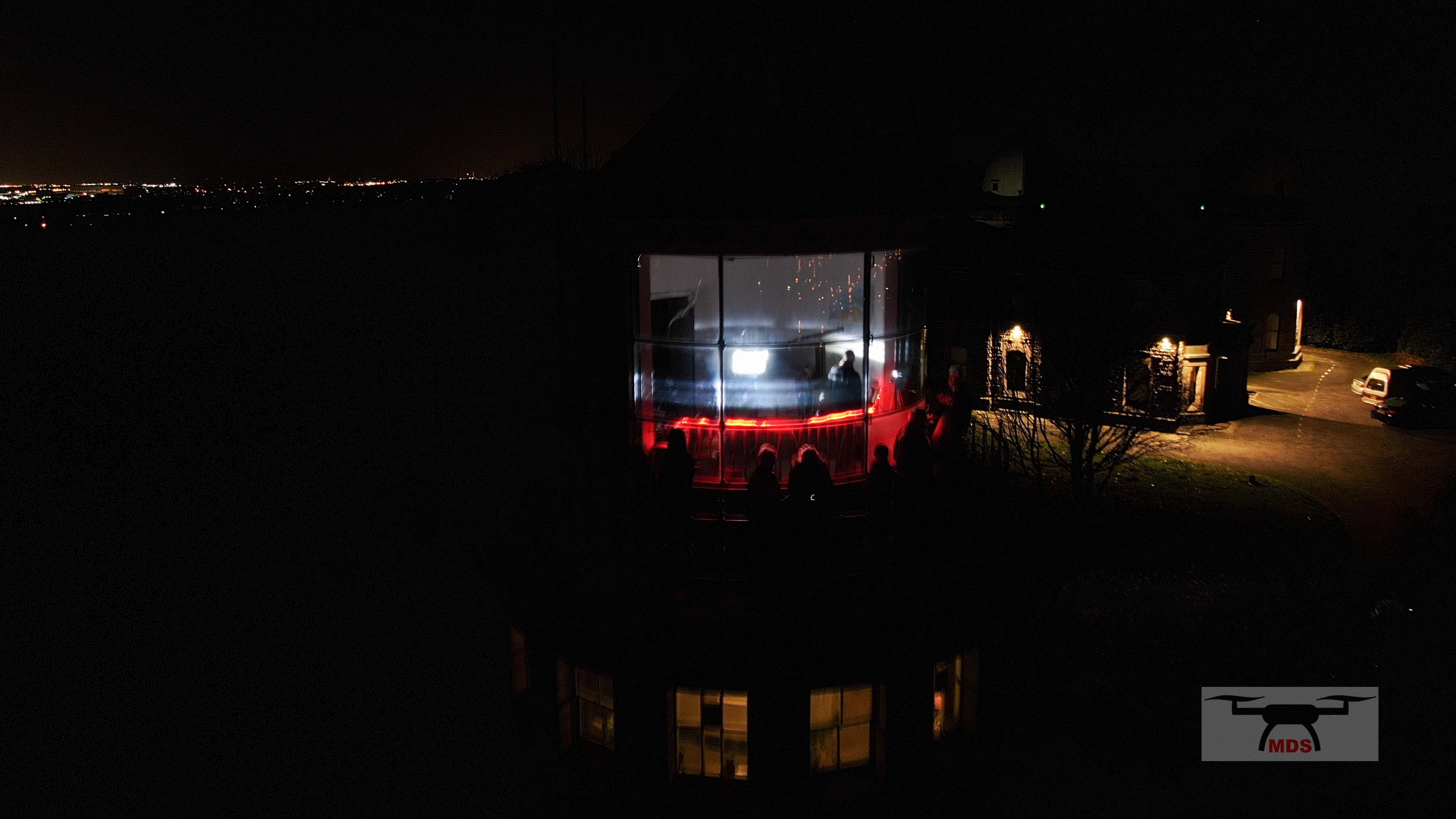 Bidston Lighthouse lit, aerial view by Merseyside Drone Services.