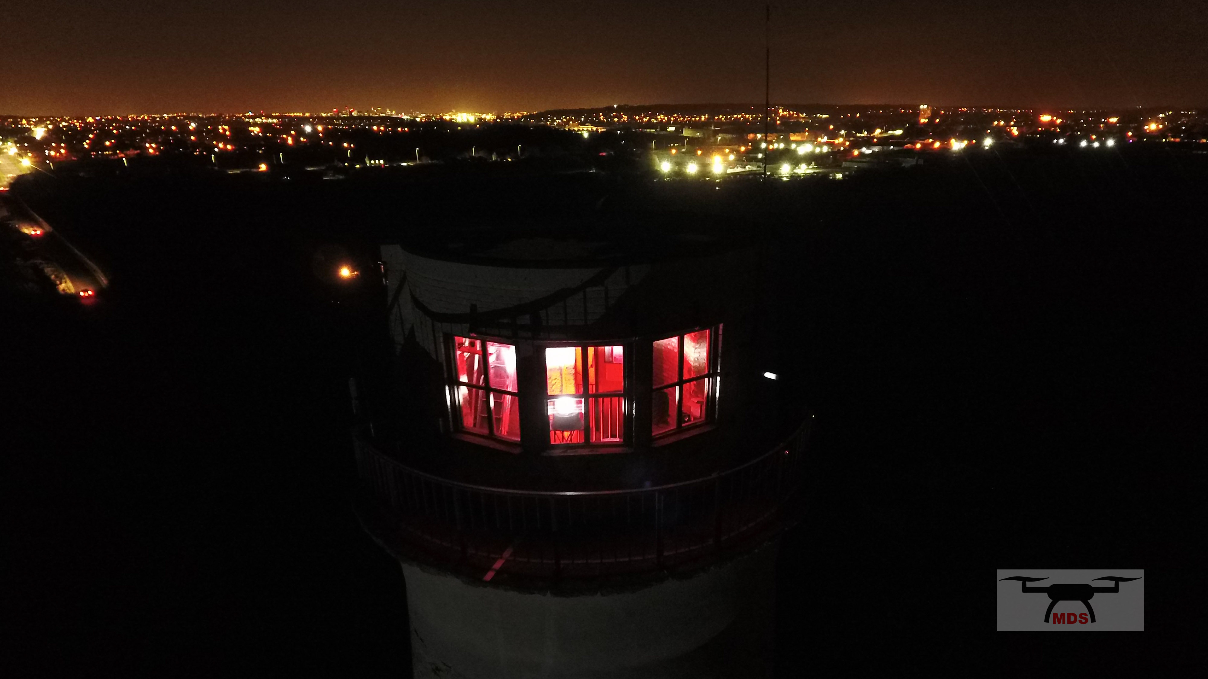 Leasowe lighthouse lit up. Photo by Merseyside Drone Services.